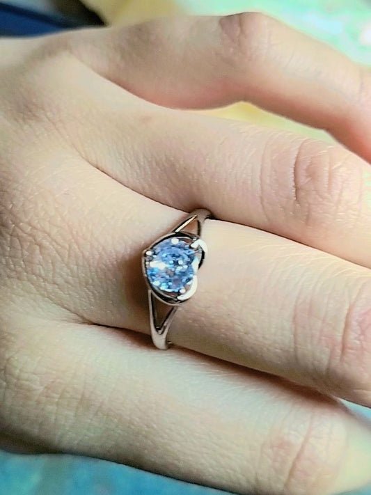 aquamarine solitaire  or heart shaped ring