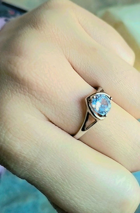 aquamarine solitaire  or heart shaped ring